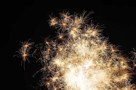 Rocket explosions of beautiful New Year's fireworksの写真素材