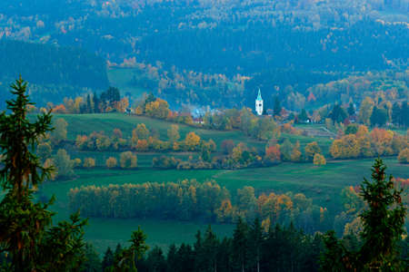 Sumava, Czech Republic, evening in Kasperske hory with church ,. Cold day in Sumava National park,...