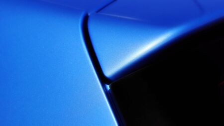 Detail of the blue car body and rear window fittingの写真素材