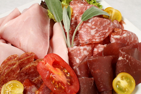 Close detail of salami selection plateの写真素材