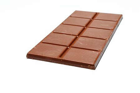 Isolated chocolate bar in perspective on the white backgroundの写真素材