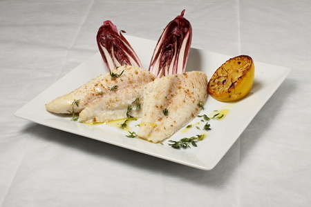 Cooked fish meat with vegetablesの写真素材