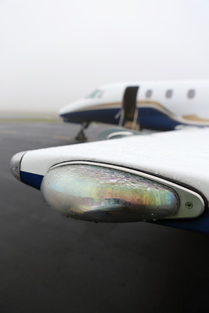 Wet glass cover of the wing tip lightの写真素材