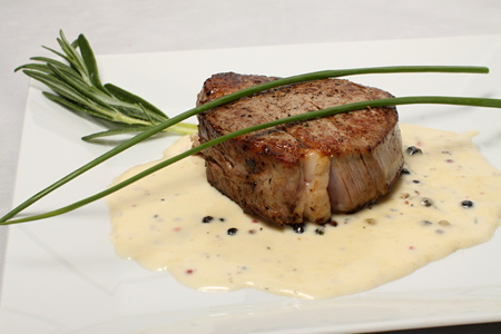 Roasted meat with white dressingの写真素材