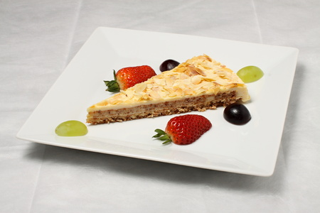 Piece of apple pie with strawberry and vineの写真素材