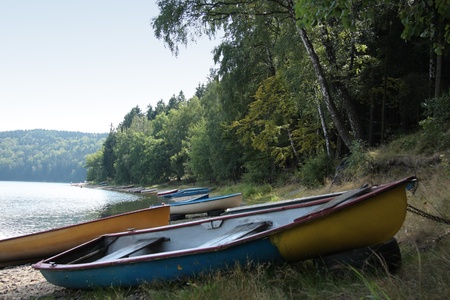 Various rowboat on the summer beach damの写真素材