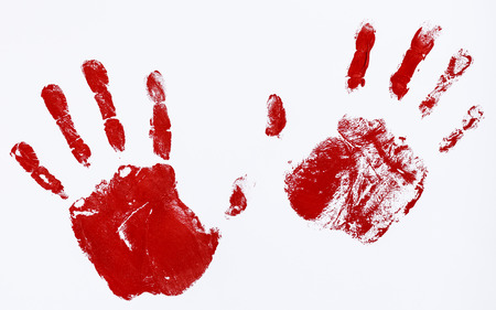 fingerprints and hands soaked in blood hindering stopの写真素材