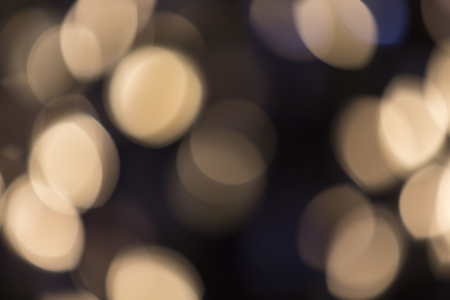 Abstract glittering lights, silver background, a real foto in the blurの写真素材