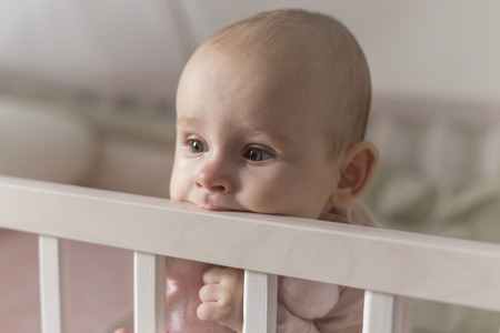 first teeth grow a baby, pain and bitingの写真素材
