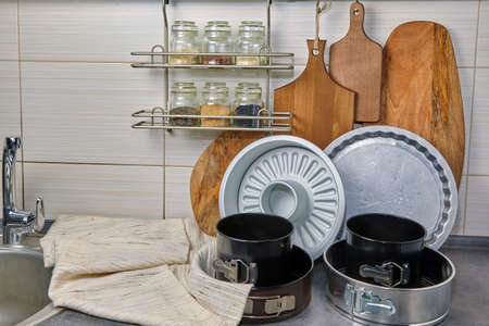 Baking dishes and cutting boards on the kitchen table