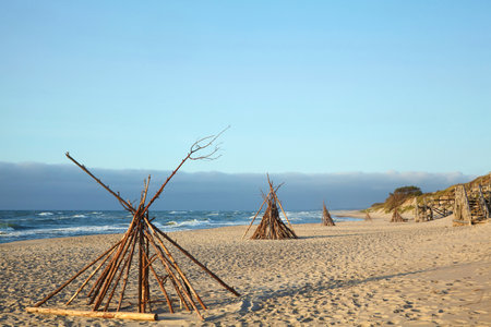The village of wigwams on the seashore