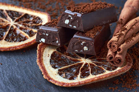 Dark chocolate with crushed almonds, cocoa powderの写真素材
