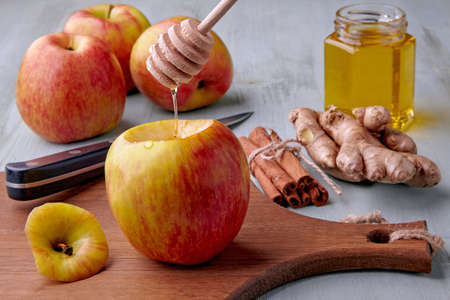 The apple prepared for baking in the ovenの写真素材