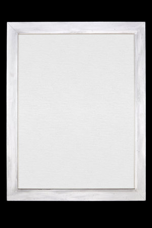 White wooden painted frame with white blank canvas isolated on black background. Vintage mock-up...