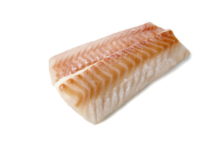 two fillets of frozen sea fish isolated on a white background