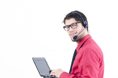 Male customer service representative at his deskの写真素材
