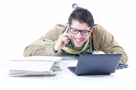 Young business man talking on the phoneの写真素材