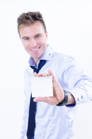 A man with cute expressions holding an empty noteの写真素材