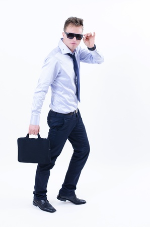 An young businessman isolated on white backgroundの写真素材