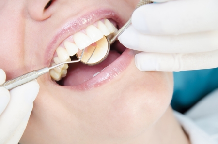 A Woman visiting her dentistの写真素材