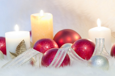 A Christmas balls collection on a white furの写真素材