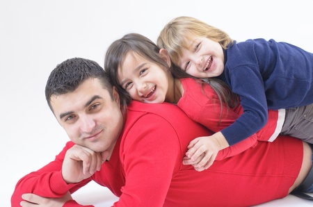 A Father with two kids isolated on whiteの写真素材