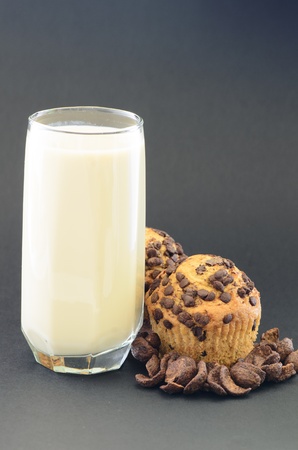 a tasty breakfast with milk and muffinsの写真素材