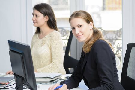 Young businesswomen working at officeの写真素材