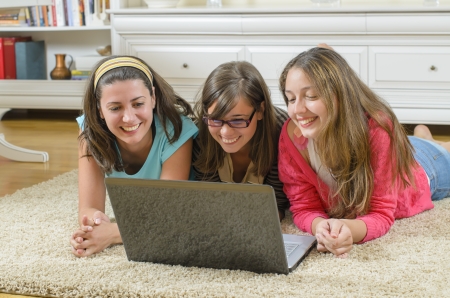Spending time on laptop together at homeの写真素材