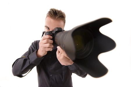 Professional Photographer taking Shot with a Telephone Lens