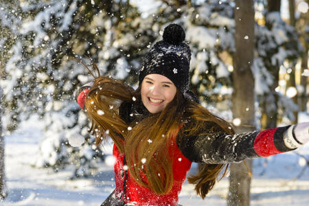 Beautiful woman enjoying winter seasonの写真素材