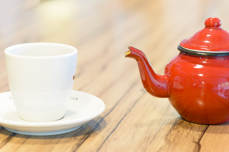 Close up of a teapot and a teacupの写真素材