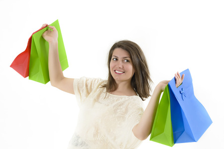 A cute girl coming happy from shoppingの写真素材