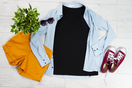 T-shirt top view, t shirt mock up, empty tshirt. Summer concept casual clothes background copy...