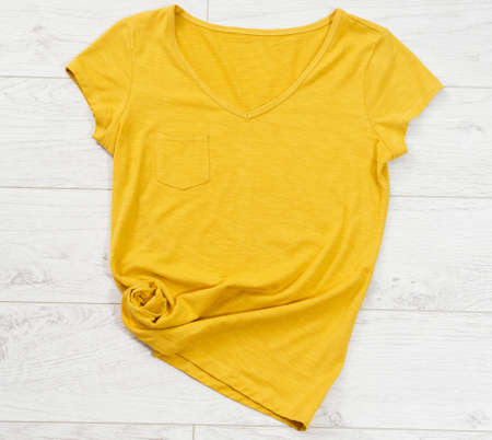 yellow tshirt mock up, yellow shirt close up - top view