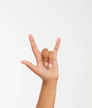 Hand making the heavy metal isolated white background. afro american hand. Mock up. copyspace. template. blank.の写真素材
