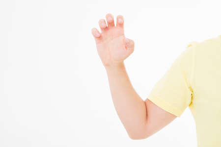 scratching male hand isolated on white background. copy spaceの写真素材