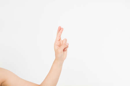 hand symbol. Finger crossed hand sign, good luck symbol isolated on white. Mock up. copyspace....