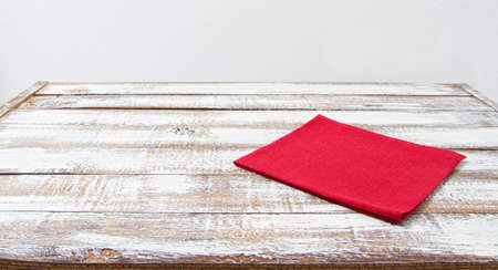 red paper napkin on wooden table with copy space - Vintage Filter, copy spaceの写真素材