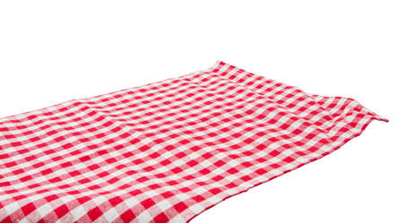 Red checkered tablecloth isolated over white background top view.の写真素材