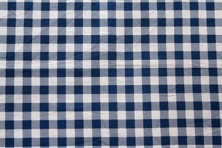 Checkered tablecloth texture top view selective focusの写真素材