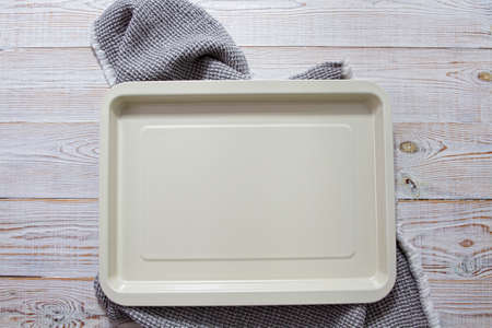 Empty food board close up, empty tray on table top viewの写真素材