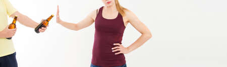 Treatment of female alcoholism - Woman refused alcohol isolated on white - copy space, bad habbitsの写真素材