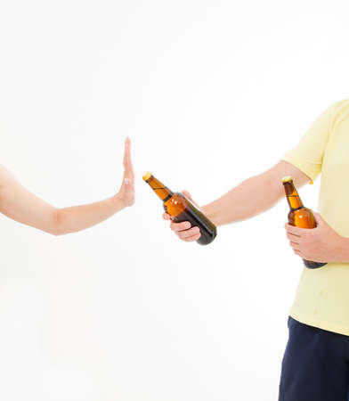 woman, girl refused alcohol drink isolated on white background.anti alcohol concept. Copy spaceの写真素材