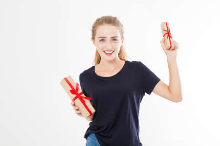 Portrait of a smiling pretty girl, woman holding stack of gift boxes isolated on white background. Holiday concept. Mock up, template.の写真素材