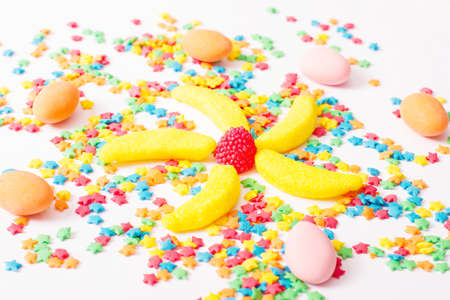 Colorful candy, lollipop and sweets isolated on white background. top view. selective focus.の写真素材