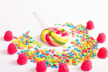 Colorful candy, lollipop and sweets isolated on white background. top view. selective focus.