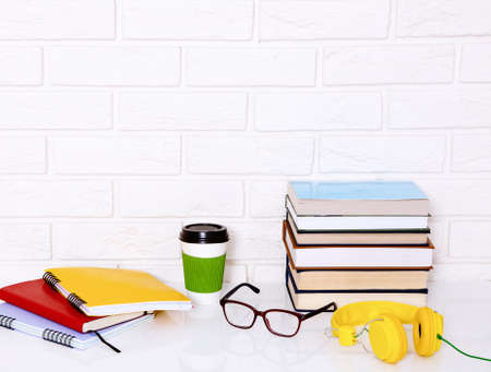 Workplace and education accessories on white table. selective focus