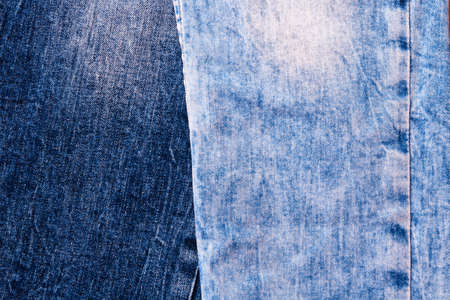Denim texture close up background, blue and dark blue jeans textureの写真素材