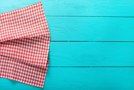 top view empty wooden table and checkered tableclothの写真素材